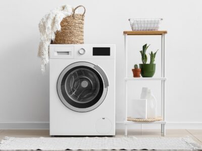 Interior,Of,Laundry,Room,With,Washing,Machine,,Shelving,Unit,And